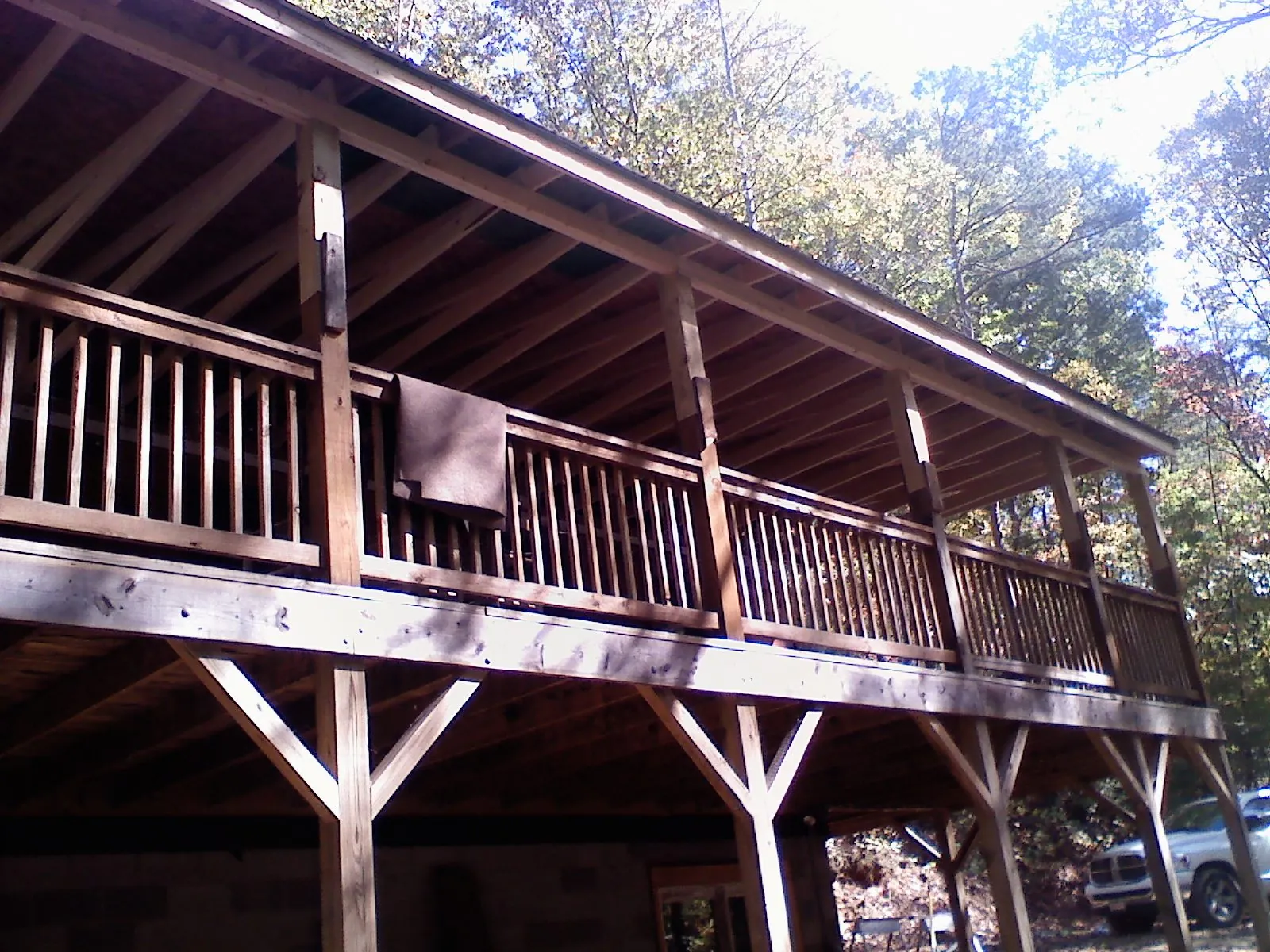 Timber framing under a new elevated porch and deck — Roof Leak Repair in Huntland by Roofing Brothers